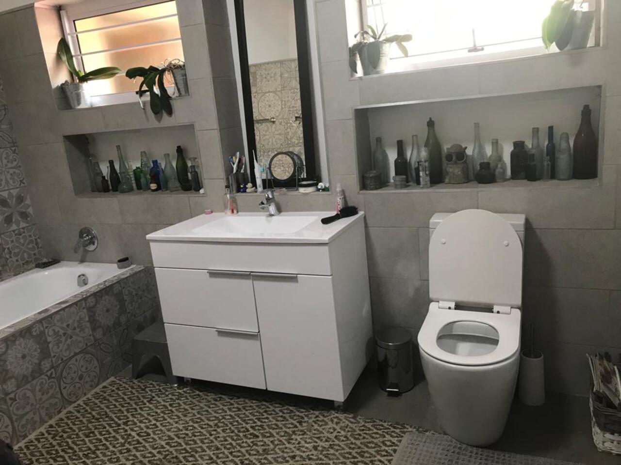 Floating double vanity and modern bathroom mirrors