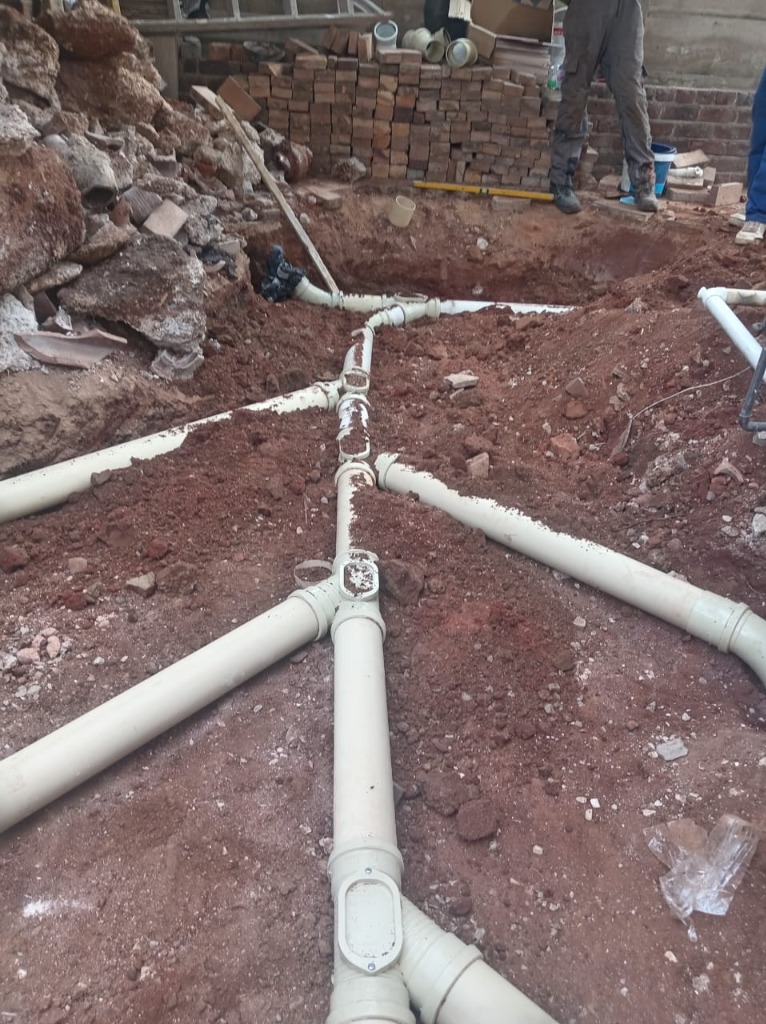 Trench excavation and professional sewer line pipe installation
